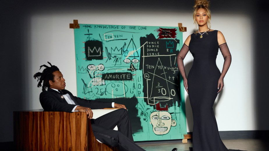 The lead image shows a photograph of Beyonce and Jay-Z.