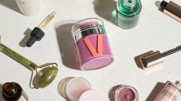 The lead image shows a flatlay of various beauty products.