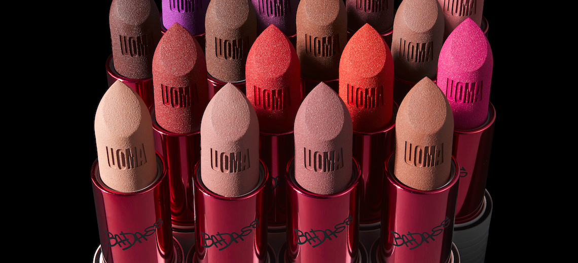 The header image shows a lineup of Uoma Beauty lipsticks.