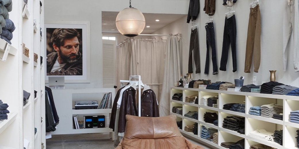 The lead image shows the inside of a clothing store.