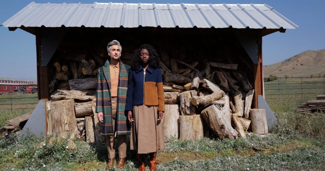 Image of Tan France outerwear on models in field